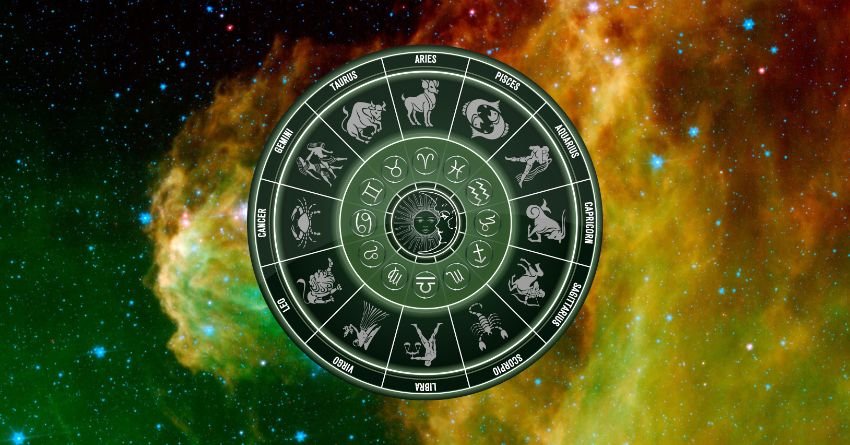 Green zodiac wheel with astrological symbols surrounded by glowing golden and cosmic energy