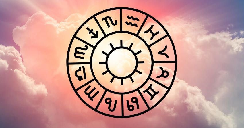 Glowing zodiac wheel with astrological symbols and a bright sun surrounded by soft pink and purple clouds