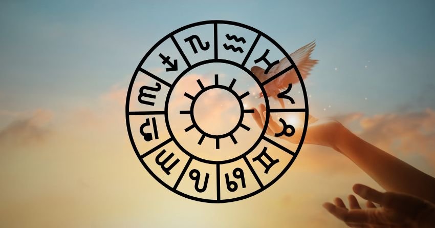 Glowing zodiac wheel with astrological symbols on a mysterious cosmic background