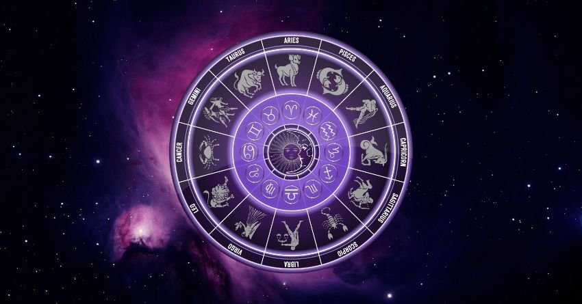 Glowing purple zodiac wheel with astrological symbols on a dark cosmic background