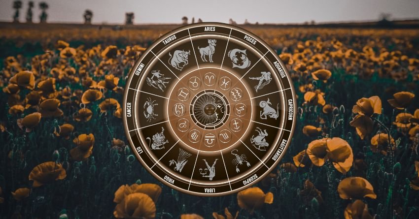 Golden zodiac wheel with astrological symbols above a field of sunflowers under a warm evening sky