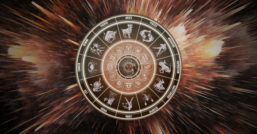 Glowing golden zodiac wheel with astrological symbols and radiant celestial energy on a dark cosmic background
