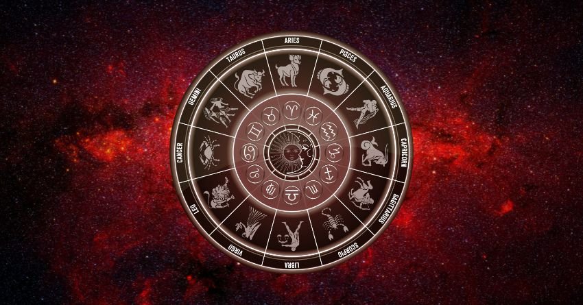 Glowing red zodiac wheel with astrological symbols on a dark fiery cosmic background